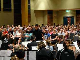 TASTE OF CULTURE: Community members perform with Queensland Symphony Orchestra musicians. Picture: Brooke Duncan