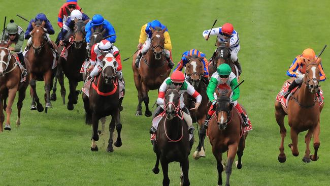 Damian Lane rides Lys Gracieux (centre) to Cox Plate victory, with Mystic Journey battling on gamely to finish fifth. Pic: Getty Images