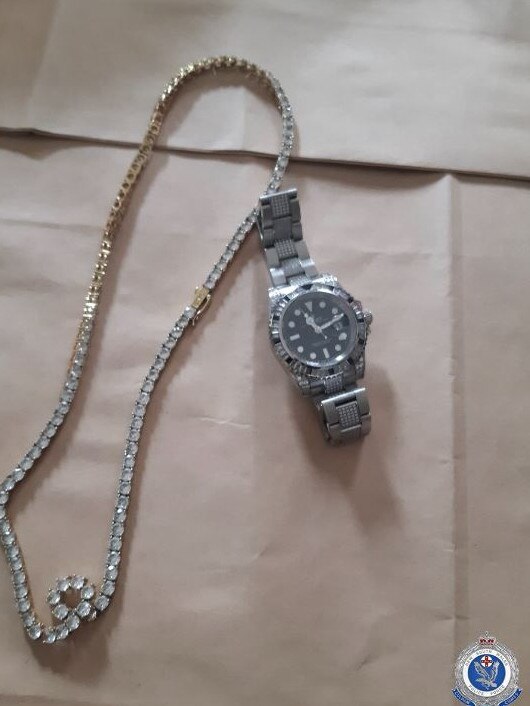 Luxury jewellery and watches were taken for further forensic examination. Picture: NSW Police