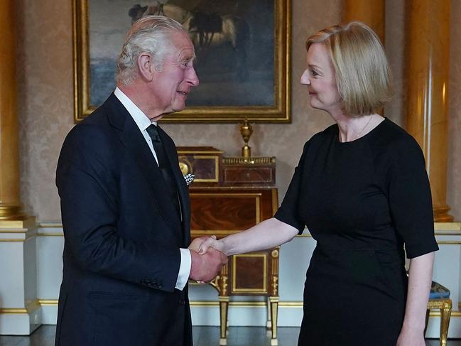 Britain's King Charles III greets Prime Minister Liz Truss during their first meeting at Buckingham Palace. Picture: AFP.