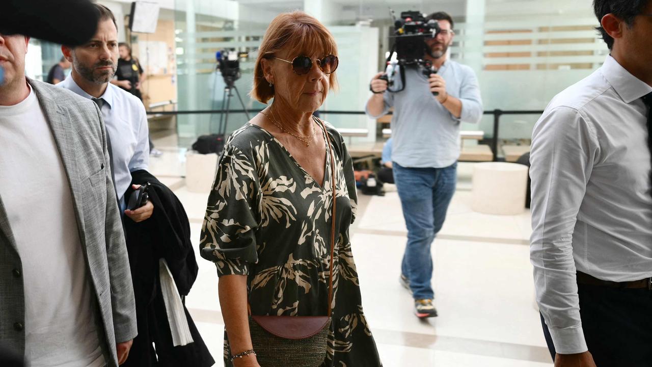 Gisele P, the alleged victim, arriving at the courthouse. She wants the proceedings to be public, as “horrible” as the ordeal will be for her. Picture: Cristophe Simon/AFP