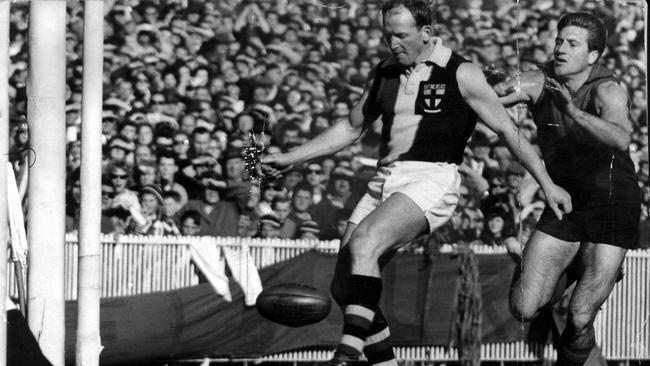 Darrel Baldock kicks a goal against Melbourne at the MCG.