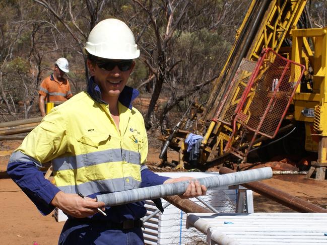 Geologist Matt Ackland inspects a drill core showing banded iron formation from Centrex Metals exploration site at Kimba Gap on Eyre Peninsula, South Australia. (Pic supplied via Corporate Conversation, March 2013)