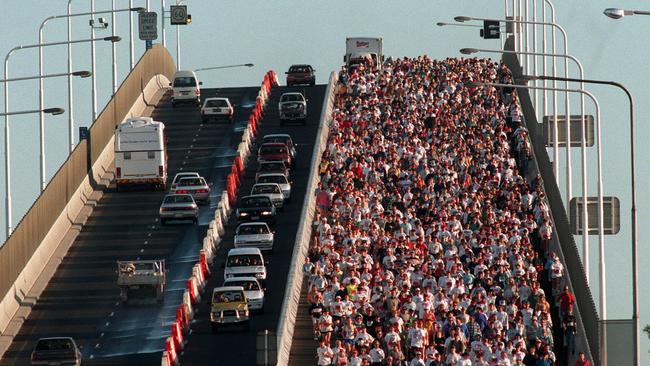 Thousands of runners fill the Gateway Bridge during the first Bridge to Brisbane fun run in 1997. Picture: Bruce Long