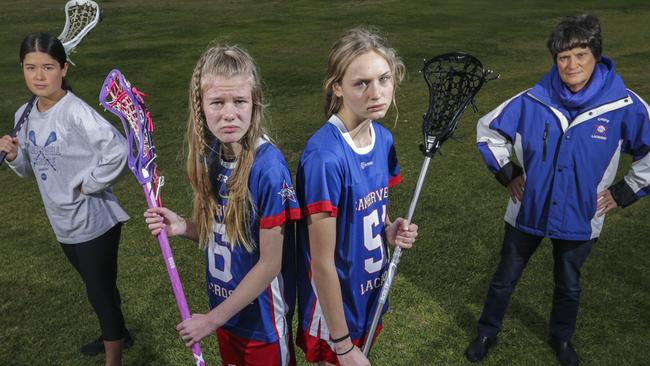 Boroondara Council has proposed to replace grass with artificial turf at Dororthy Laver Reserve. L/R Amanda Hollenkamp, Ella Jameson, Poppy Ashby and Jennie Easson of Camberwell Lacrosse Club. Picture: Wayne Taylor