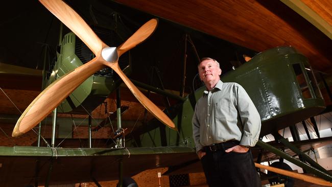 Andy Thomas with Sir Ross and Sir Keith Smith’s Vickers Vimy at Adelaide. Picture: AAP