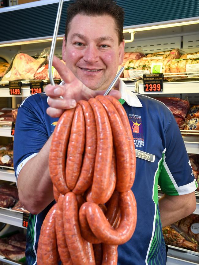 Butcher Piero Mastromanno with his award-winning snags. Picture: PENNY STEPHENS