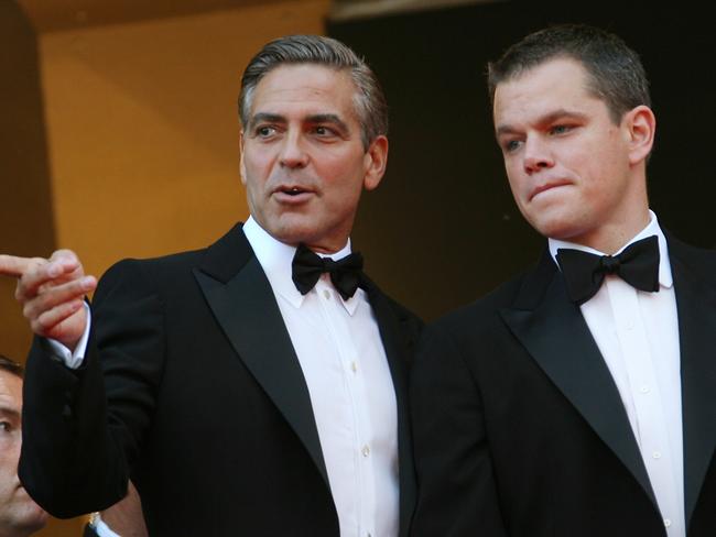 Old mates George Clooney and Matt Damon at Cannes in 2007. Picture: AFP / Anne-Christine Poujoulat