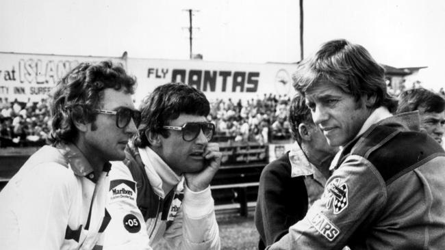 Former driver John Harvey (L) with Peter Brock (C) &amp; Dick Johnson before final race of deciding round of 1981 Australian Touring championship.