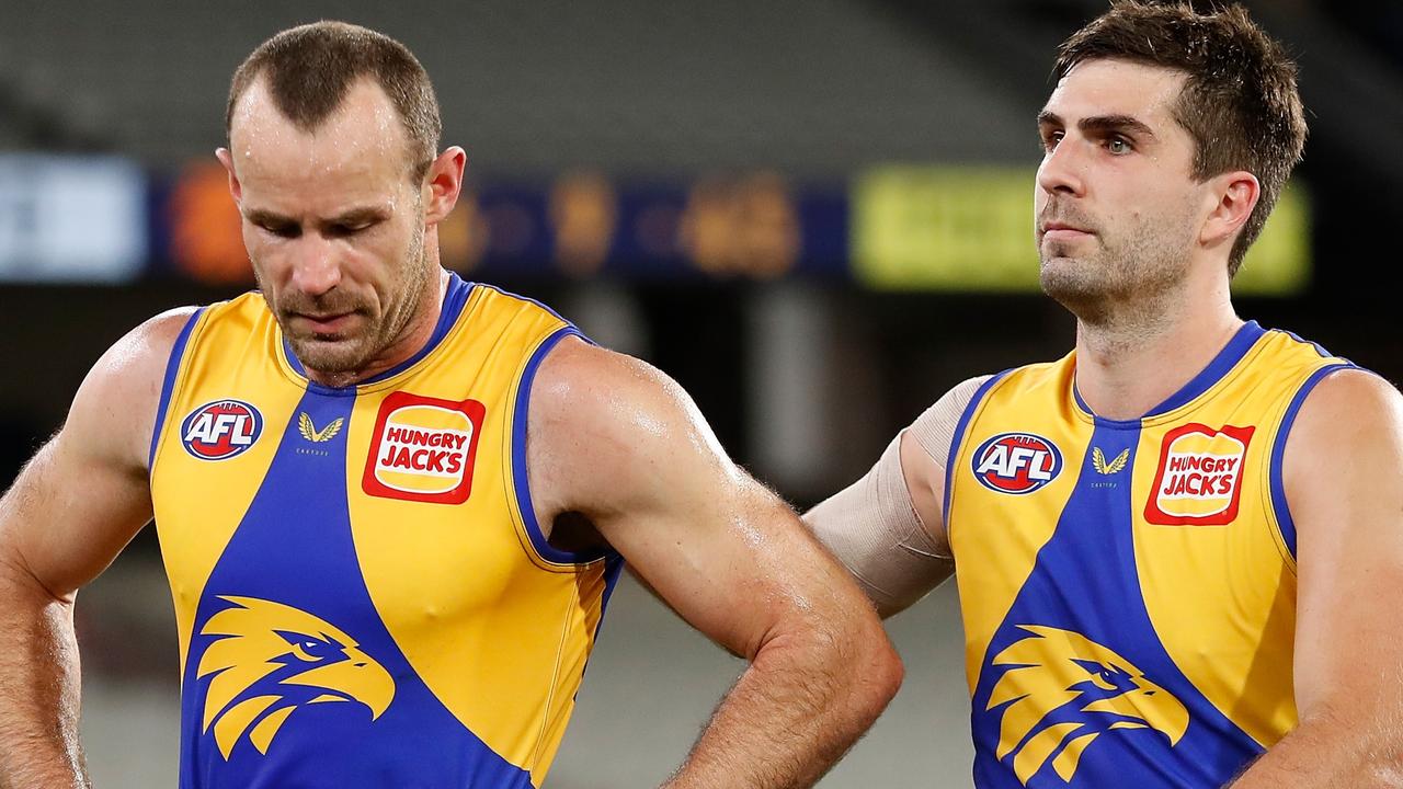 MELBOURNE, AUSTRALIA - JULY 31: Shannon Hurn (left) and Andrew Gaff of the Eagles look dejected after a loss during the 2021 AFL Round 20 match between the Collingwood Magpies and the West Coast Eagles at the Melbourne Cricket Ground on July 31, 2021 in Melbourne, Australia. (Photo by Michael Willson/AFL Photos via Getty Images)