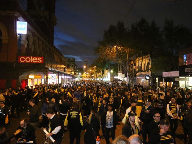 Richmond fans celebrate in Swan St. Picture: Yuri Kouzmin