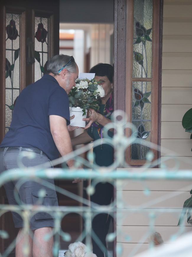 Flowers arrive at Jackie Trad’s West End home.