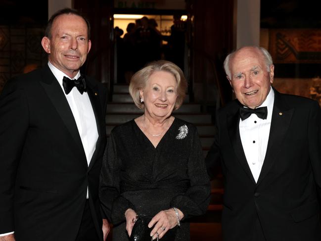 Former PM Tony Abbott (left) with former PM John Howard and his wife Jeanette and John Howard. Picture: The Australian