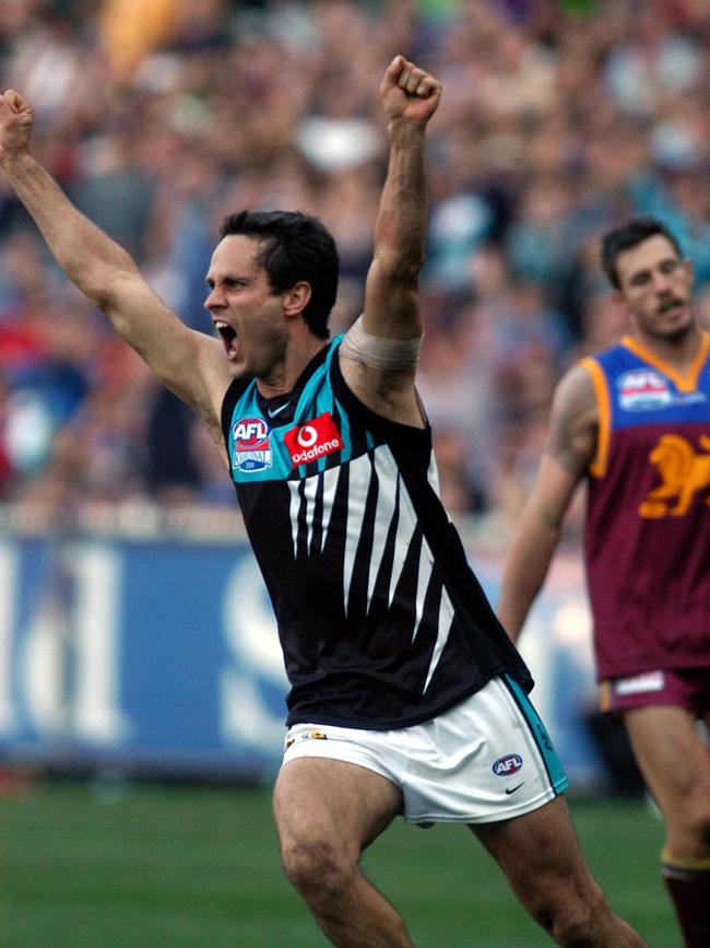 Gavin Wanganeen celebrates a last quarter goal in the 2004 AFL Grand Final.