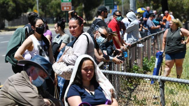 People are seen queuing up at a COVID testing centre in SA.