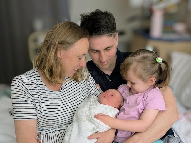 New arrival Lucy Maeve, her big sister Ellie (born in HPH in November 2021), father Nick and mother Hayley Platts in January 2025. Deliver for Tassie Mums campaign. Picture: Hayley Platts