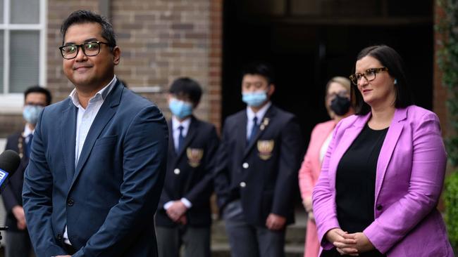 Fadzli Bin Abdul Rahman (left) with Sarah Mitchell. Rahman, who after more than a decade working as a chemical engineer, is now on track to become a much-needed science teacher in a NSW public school. Picture: NCA NewsWire / James Gourley