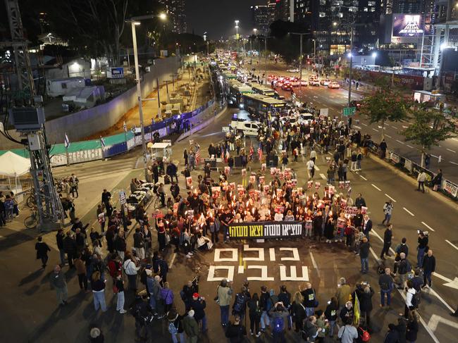 Israelis take to the streets after hearing news of the ceasefire. Picture: AFP