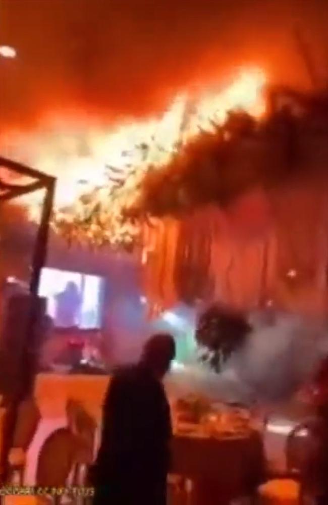 Online footage shows flames quickly engulfing the venue’s roof. Picture: X