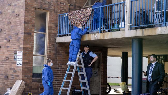 Forensics officers swarmed the apartment complex on Monday. Picture: NCA NewsWire / Dylan Coker