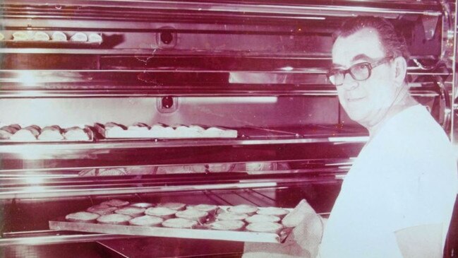 Mervyn 'Snowy' Byrne baking a full tray of pies at the Byrne's Pie Factory in 1975.