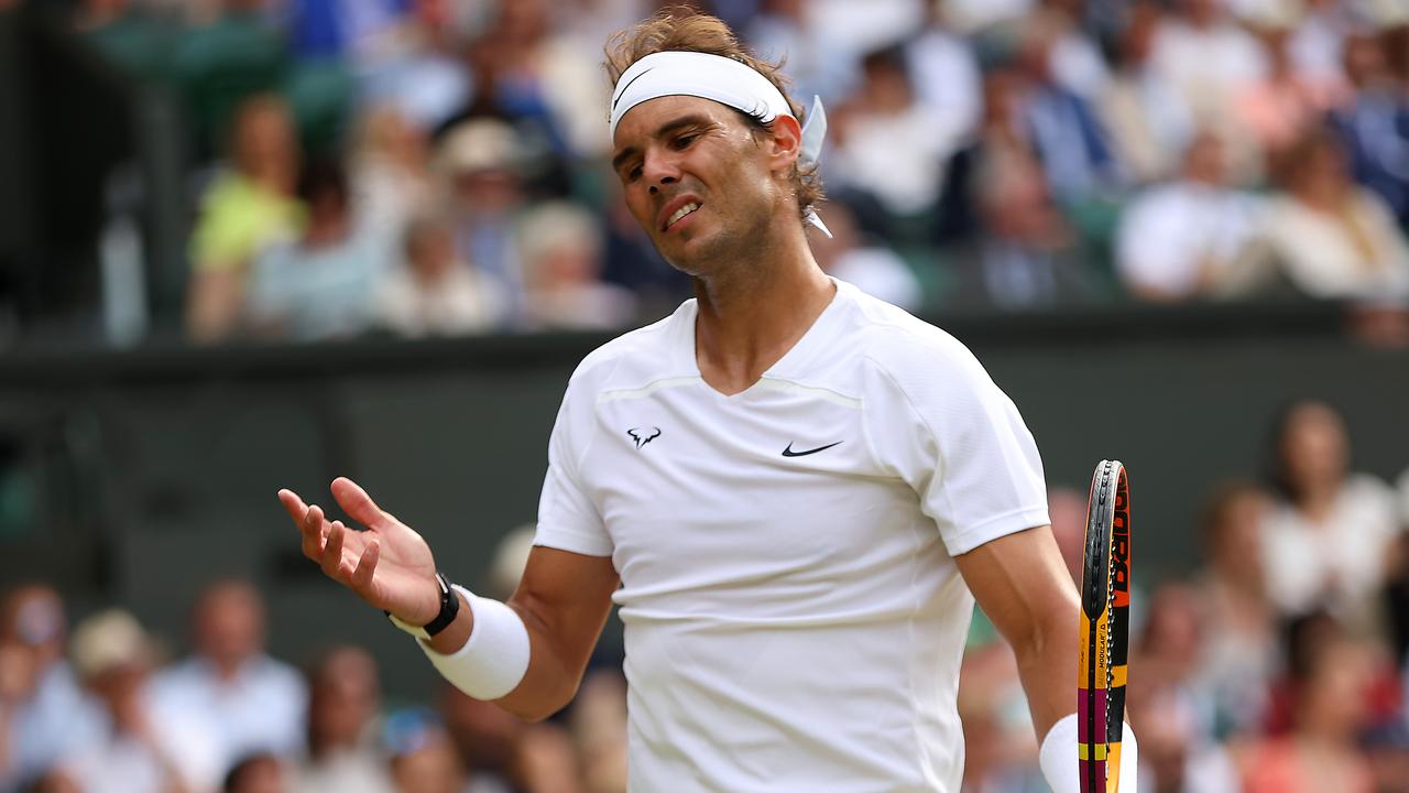 Rafael Nadal is out of Wimbledon due to an abdominal injury. (Photo by Clive Brunskill/Getty Images)