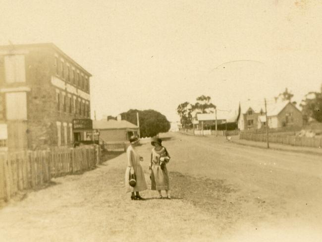 The general store in Swansea, Tasmania, has been in the Morris family’s hands for 150 years. Pictured in Franklin St, in front of the businessm were Hilda and Lou Rapp. Picture: COURTESY OF GLAMORGAN SPRING BAY HISTORICAL SOCIETY/MAUREEN FERRIS.