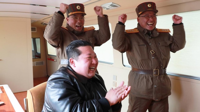 The North Korean leader Kim Jong-un and generals celebrate the successful test of an intercontinental ballistic missile last month. Picture: EPA