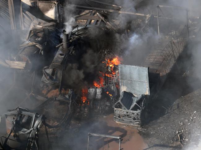 Firefighters battling a large factory Fire in Campbellfield., releasing toxic fumes into the air.   Picture: Alex Coppel.