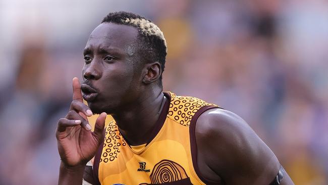 ADELAIDE, AUSTRALIA - MAY 19: Mabior Chol of the Hawks celebrates a goal during the 2024 AFL Round 10 match between Yartapuulti (Port Adelaide Power) and the Hawthorn Hawks at Adelaide Oval on May 19, 2024 in Adelaide, Australia. (Photo by Sarah Reed/AFL Photos via Getty Images)