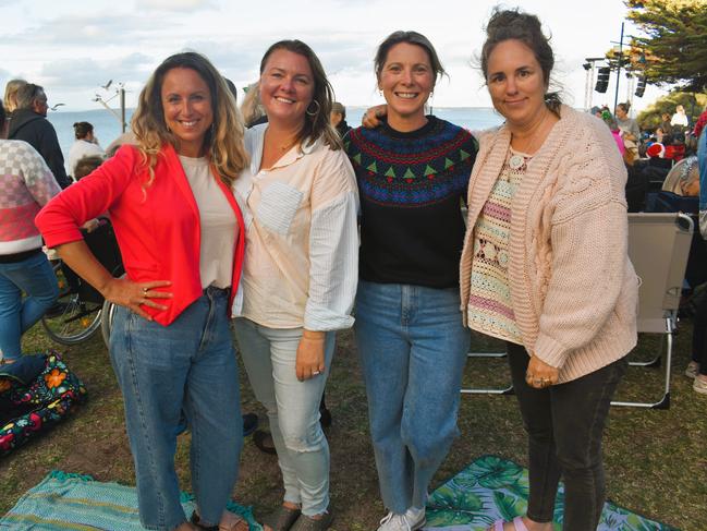 Melanie Beynon, Kelly Nihver, Shannon Bassed and Megan Savona getting festive at the Phillip Island Christmas Carols by the Bay at the Cowes Foreshore on Tuesday, December 10, 2024. Picture: Jack Colantuono