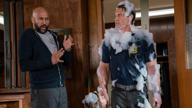 L-R: Keegan-Michael Key, Finley Rose Slater, and John Cena in a scene from the movie Playing With Fire. Supplied by Paramount Pictures.