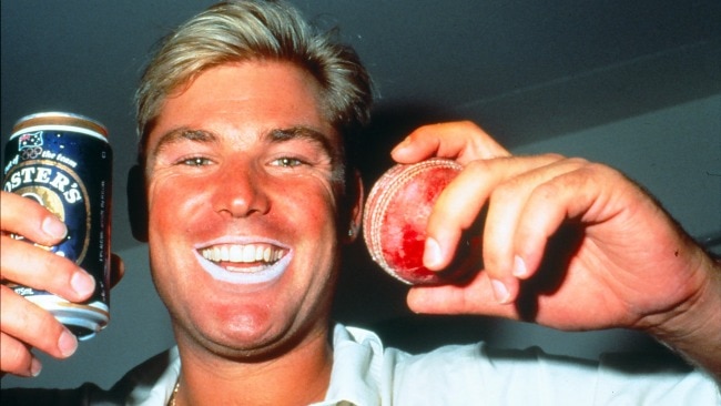 A young Shane Warne enjoying a beer after a Test match. Picture: Getty Images