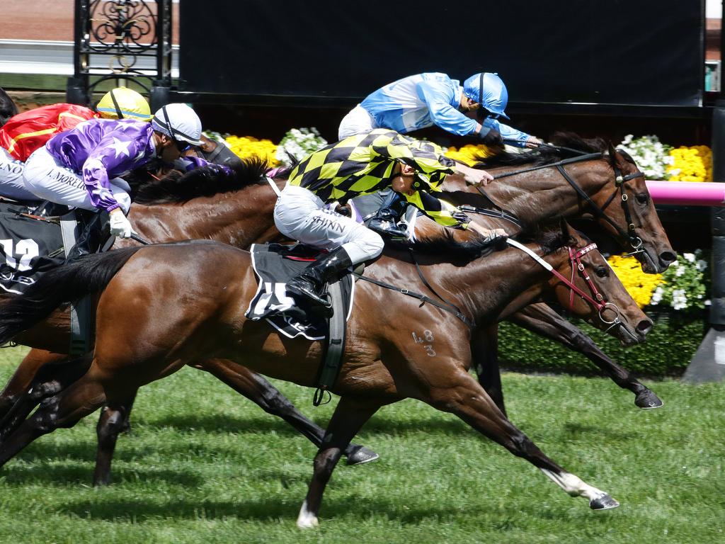 Blake Shinn on Jennifer Lynn (outside) pipped Prompt Response (Kerrin McEvoy) in race 6 as punters prepared for the day’s main event. Picture: Andrew Tauber