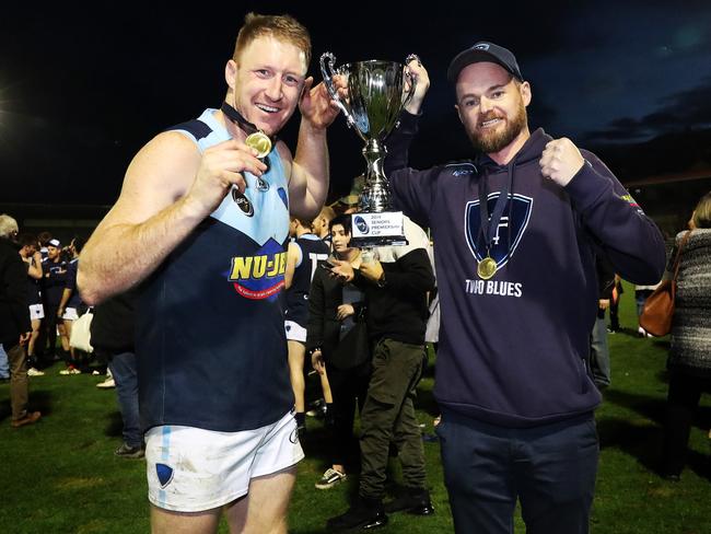 Southern Football League grand final 2019. Lindisfarne V Huonville at North Hobart Oval. Lindisfarne Michael Cassidy and coach Daniel Willing after the teams win. Picture: NIKKI DAVIS-JONES