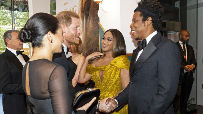 Prince Harry and Jay-Z shake hands. Picture: Niklas Halle'n-WPA Pool/Getty Images