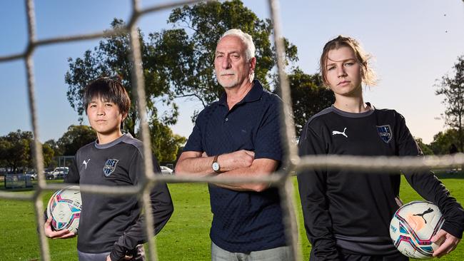 Yuka Sasaki with president, Jim Tsouvalas, and Izabel Czechowicz from the Adelaide Comets Football Club, where Adelaide City Council have knocked back a request for a 1.1m fence to be built. Picture: Matt Loxton