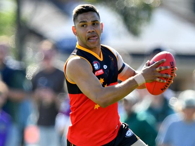 Neville Jetta of the Fitzroy Stars runs with the ball during the 2024 Northern Football Netball League Division 3 Heidelberg Golf Club Seniors Grand Final match between the Fitzroy Stars and the Old Paradians at Lalor Reserve, on September 07, 2024, in Melbourne, Australia. (Photo by Josh Chadwick)