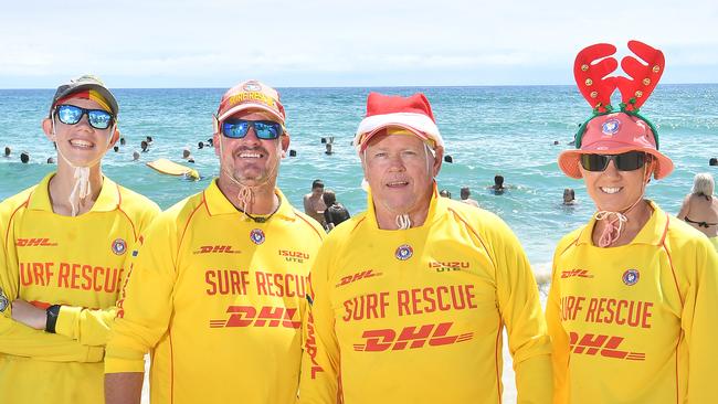 Laith Scott, David Armson, John Roehrig and Peta Edwards doing volunteer surf life saver patrol on the Gold Coast on Christmas Day. Picture: John Gass