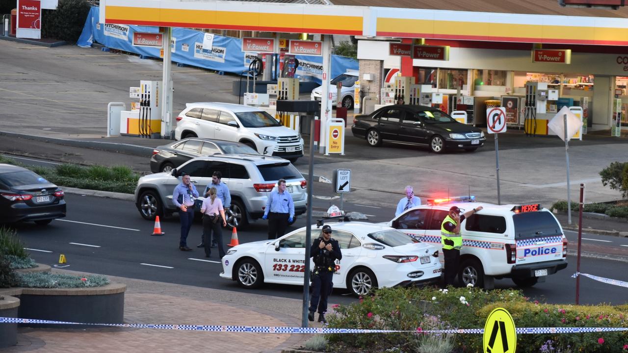 The crime scene after Toowoomba man Robert Brown was pushed on the busy roadway during peak hour traffic. A yellow marker shows were Mr Brown fell, and the taxi that stopped to help. Picture: Peta McEachern