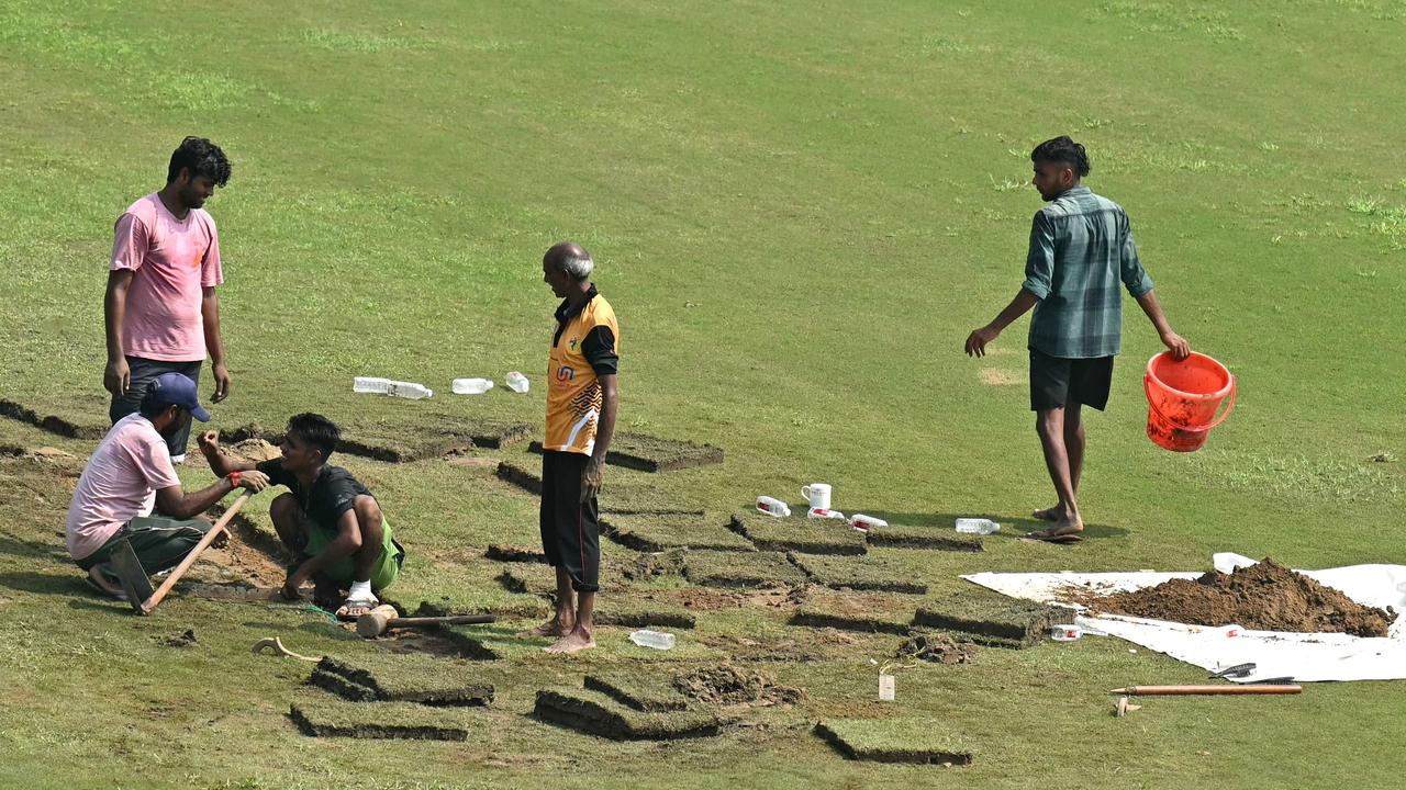 Farcical scenes unfolded ahead of the historic Test. (Photo by Money SHARMA / AFP)