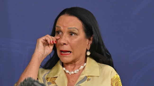 Indigenous Australians Minister Linda Burney tears up during a news conference on Thursday to announce her impending retirement from parliament. Picture: AAP Image/Mick Tsikas=