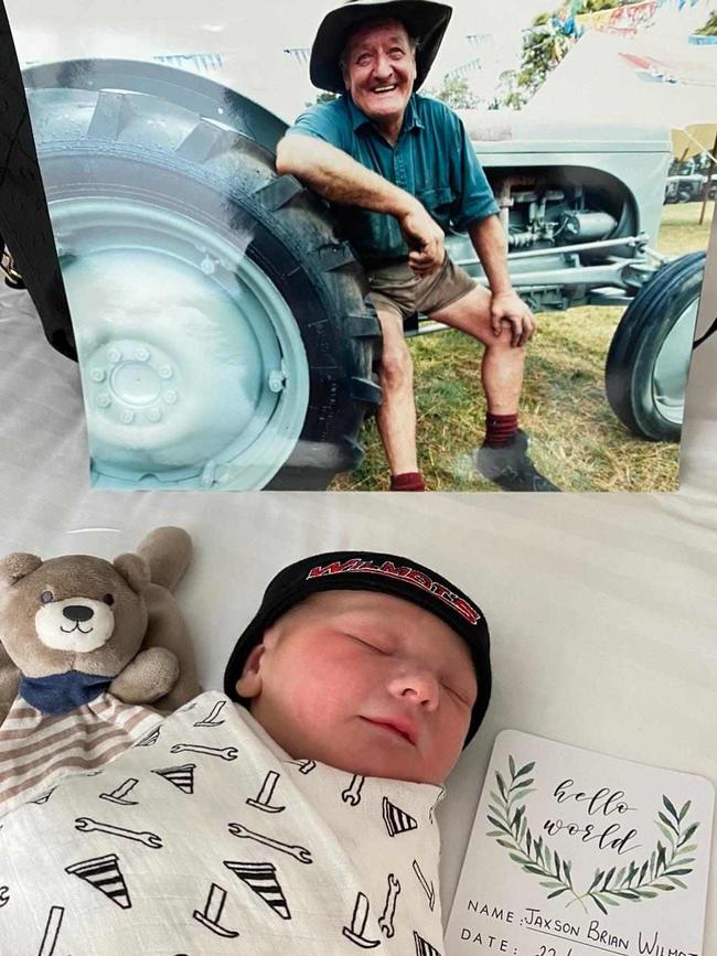 Jaxson Wilmot with a picture of his great grandfather Peter Wilmot, who were both born on February 22. Photo: Contributed