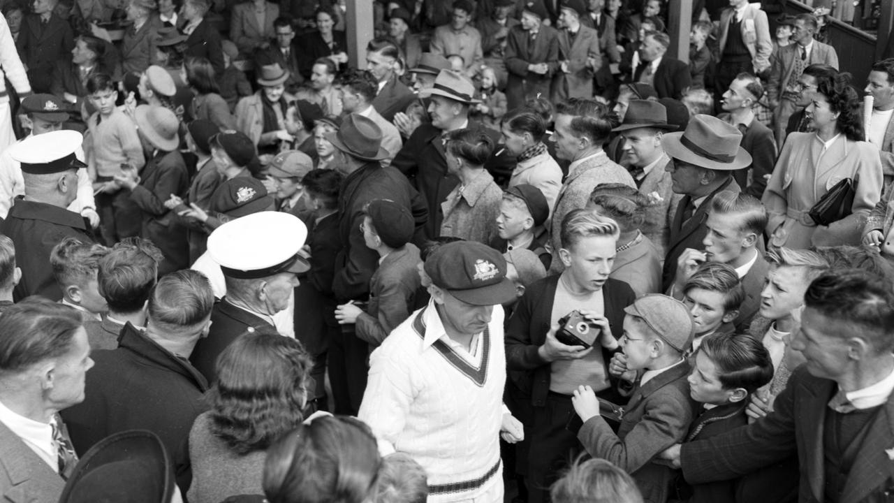 Don Bradman walking on to the TCA Ground in Hobart in March 1948. Picture: The Mercury