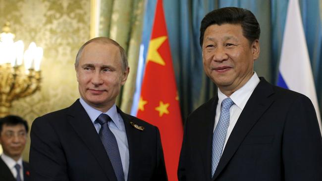 Russian President Vladimir Putin, left, with his Chinese counterpart Xi Jinping at the Kremlin. Picture: AP