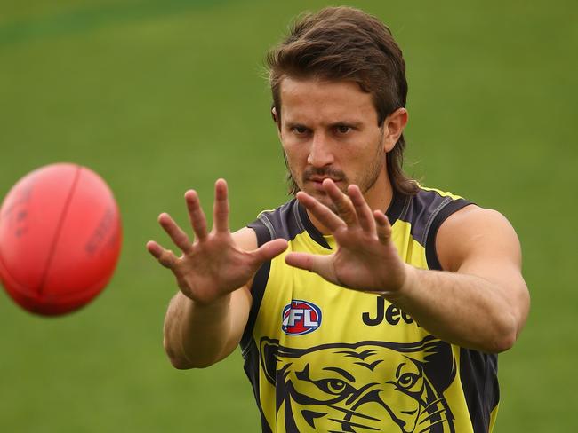 MELBOURNE, AUSTRALIA - APRIL 21: Ivan Maric of the Tigers controls the ball during a Richmond Tigers AFL training session at Punt Road Oval on April 21, 2016 in Melbourne, Australia. (Photo by Robert Cianflone/Getty Images)