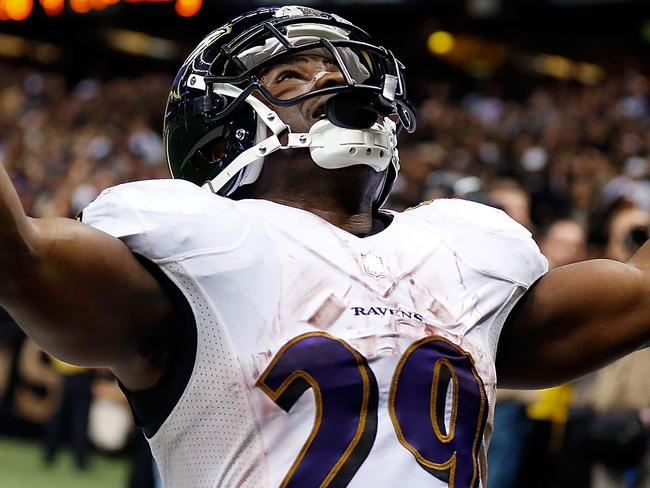 NEW ORLEANS, LA - NOVEMBER 24: Justin Forsett #29 of the Baltimore Ravens celebrates a touchdown against the New Orleans Saints during the fourth quarter of a game at the Mercedes-Benz Superdome on November 24, 2014 in New Orleans, Louisiana. Wesley Hitt/Getty Images/AFP == FOR NEWSPAPERS, INTERNET, TELCOS & TELEVISION USE ONLY ==