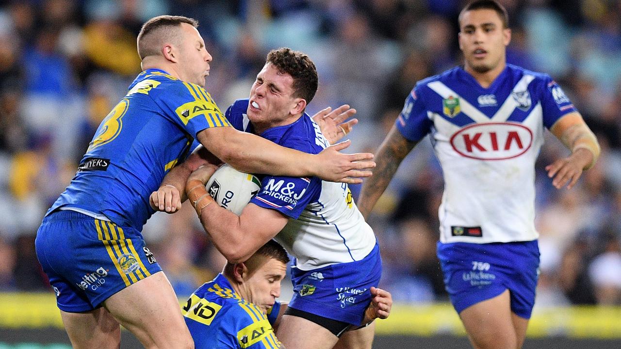 Former Bulldogs teammates Adam Elliott and Michael Lichaa have patched up their friendship. Picture: AAP Image/Dan Himbrechts