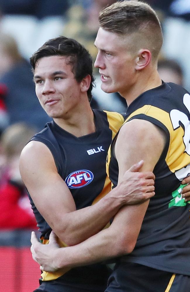 Daniel Rioli and Callum Moore after a Richmond goal last Saturday against St Kilda. Picture: Getty Images