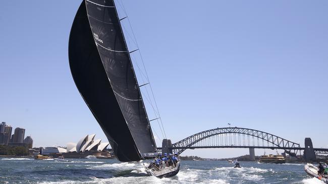 Black Jack, approaches the finish to win the Big Boat Challenge, a lead-up event to the Sydney Hobart open ocean yacht race, on Sydney Harbour in Sydney, Tuesday, Dec. 12, 2017. The Sydney Hobart yacht race begins on Dec. 26. (AP Photo/Rick Rycroft)